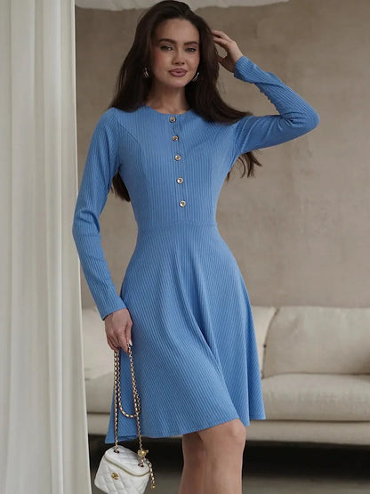 Skyline Muse ribbed sky-blue mini dress with long sleeves, button placket, and A-line silhouette for elegant occasions.