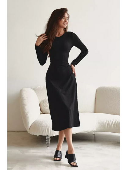 Elegant black mid-length dress with long sleeves, perfect for formal occasions or casual outings.