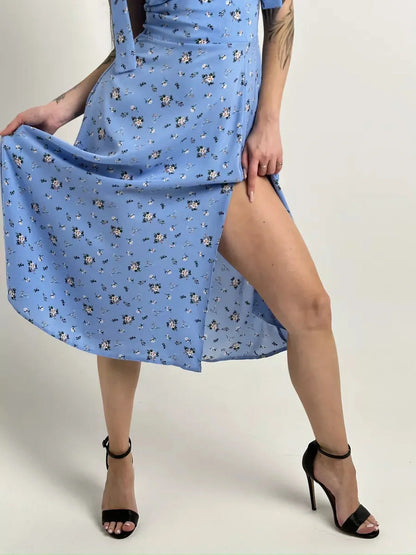 Floral Charm Midi Dress featuring floral prints, a thigh slit, and elegant shoulder ties, perfect for weddings and special occasions.