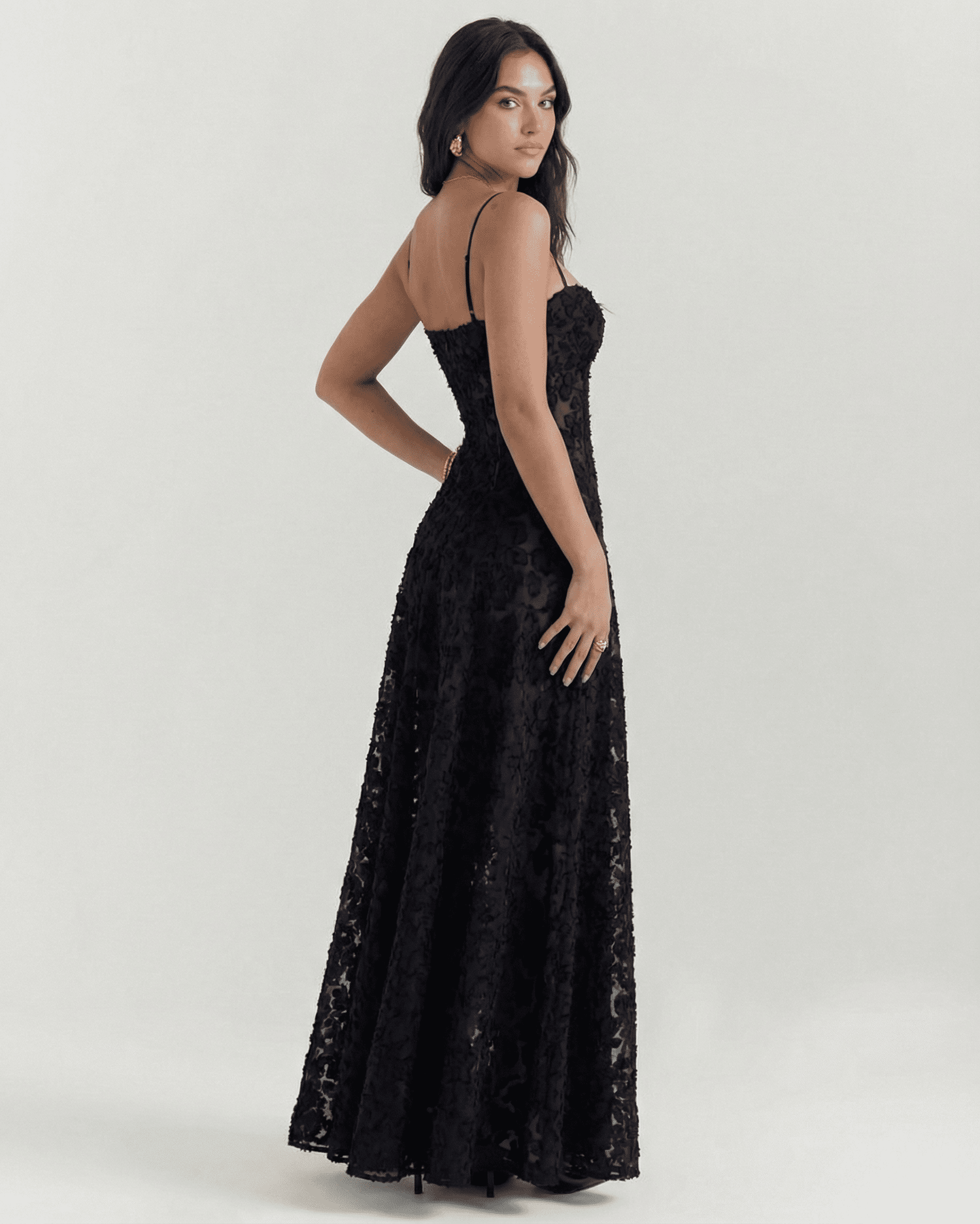Nerina Maxi Dress by Slimona in black floral lace, showcasing the elegant sheer back detail and fitted bodice.