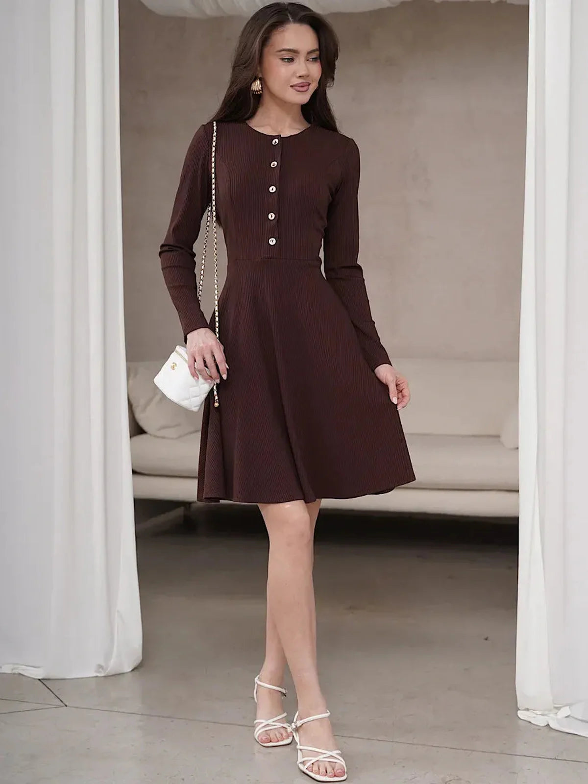 Elegant mocha mini dress featuring long sleeves and buttons, perfect for weddings, parties, or a night out.
