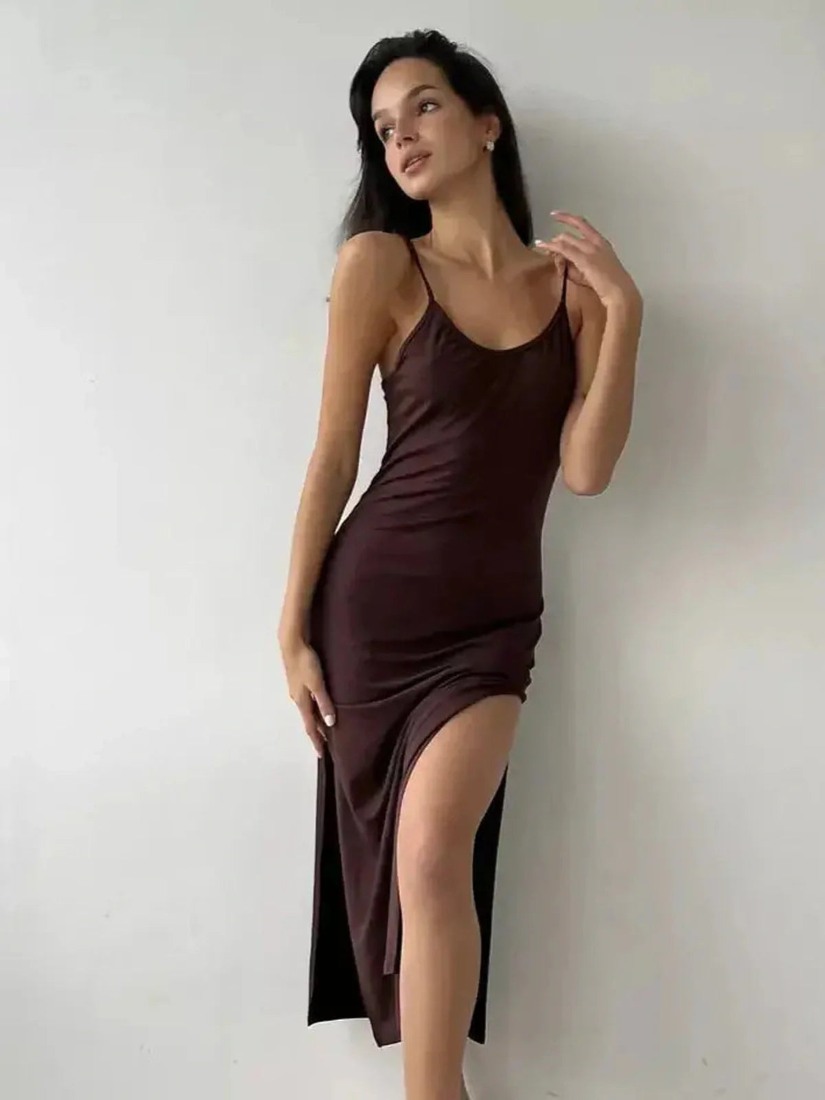 Noir Muse Midi Dress in deep chocolate satin featuring a side slit and a flattering silhouette for elegant occasions.