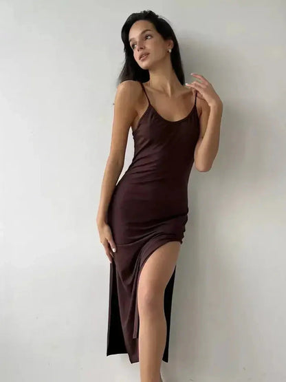 Noir Muse Midi Dress in deep chocolate satin featuring a side slit and a flattering silhouette for elegant occasions.