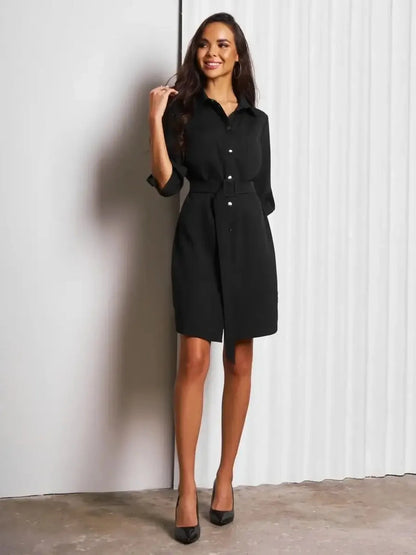 Urban Edit Mini black mini dress with a structured silhouette and detachable belt, ideal for versatile styling.