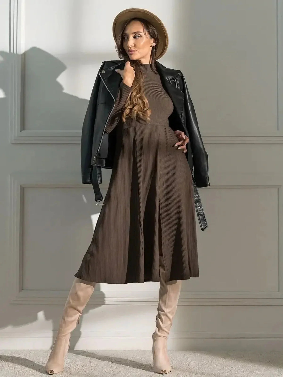 Mocha Muse Midi Dress styled with a leather jacket and hat, showcasing elegant earthy tones and a chic silhouette.