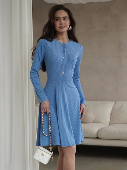 Skyline Muse mini dress in sky-blue, featuring long sleeves and front button placket, ideal for summer and casual chic occasions.