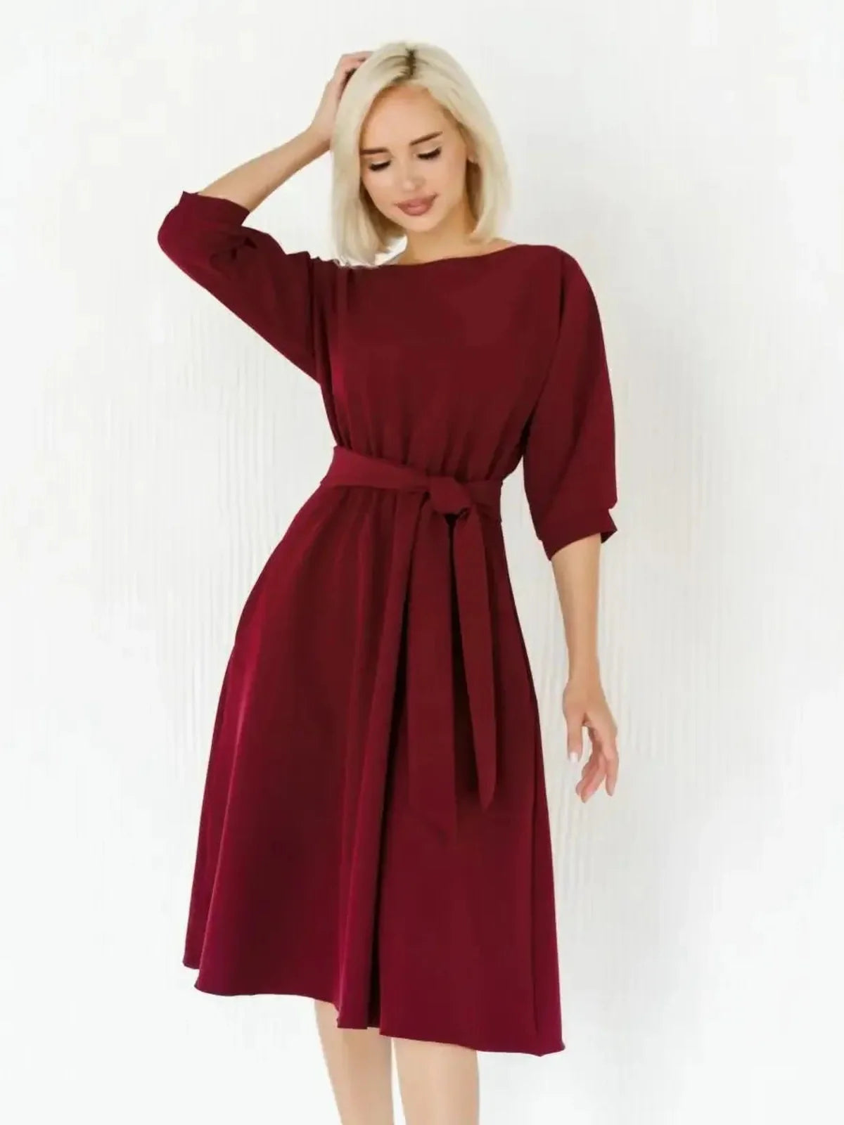 Crimson Grace Midi Dress in burgundy with flowing A-line skirt and self-tie belt, perfect for weddings and formal events.