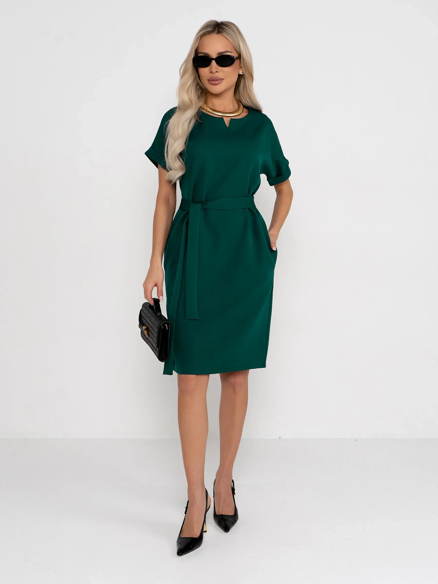 Emerald Mode mini dress featuring a notched neckline, belt, and cuffed sleeves, perfect for weddings and special occasions.