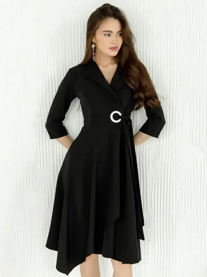 Chic black midi dress with wrap silhouette, asymmetric hem, and silver-tone ring detail, perfect for formal occasions.