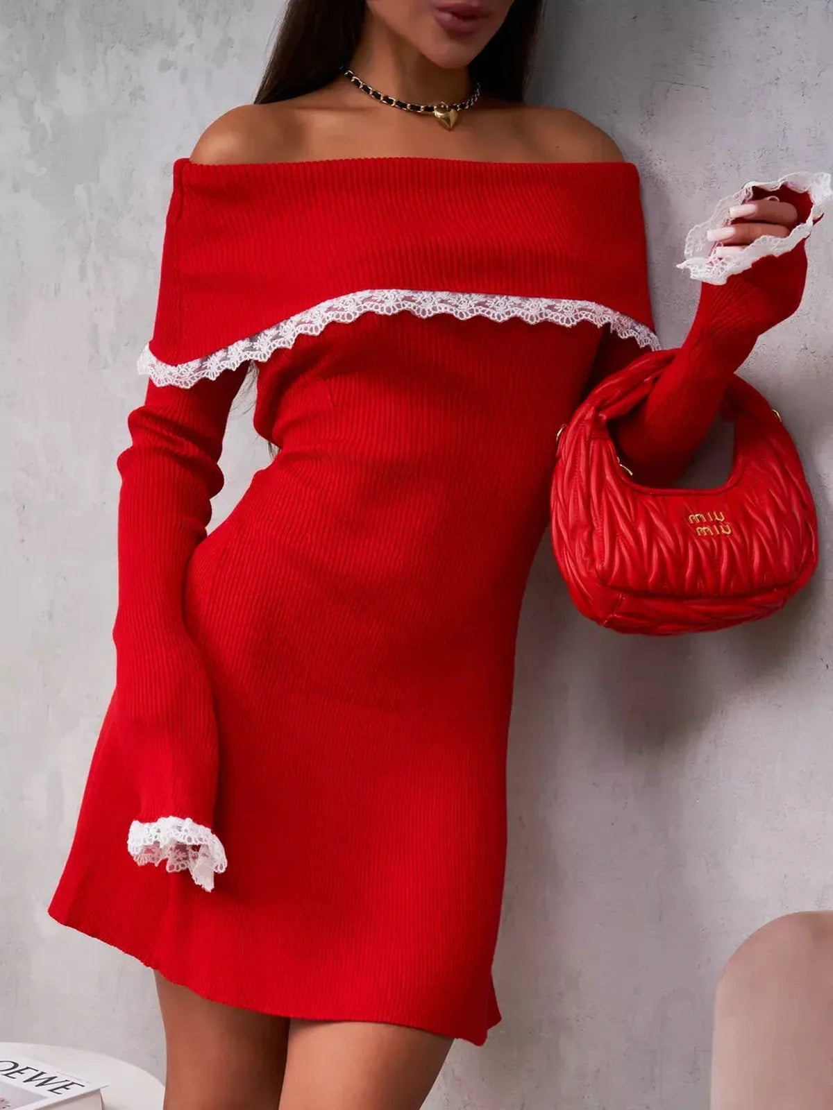 Off-shoulder red mini dress with lace trim, perfect for cocktail parties or summer outings, showcasing modern femininity.