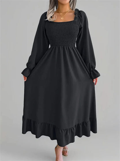 Elegant black Ruffle Grace Midi Dress featuring a smocked bodice and romantic long sleeves, perfect for formal occasions.