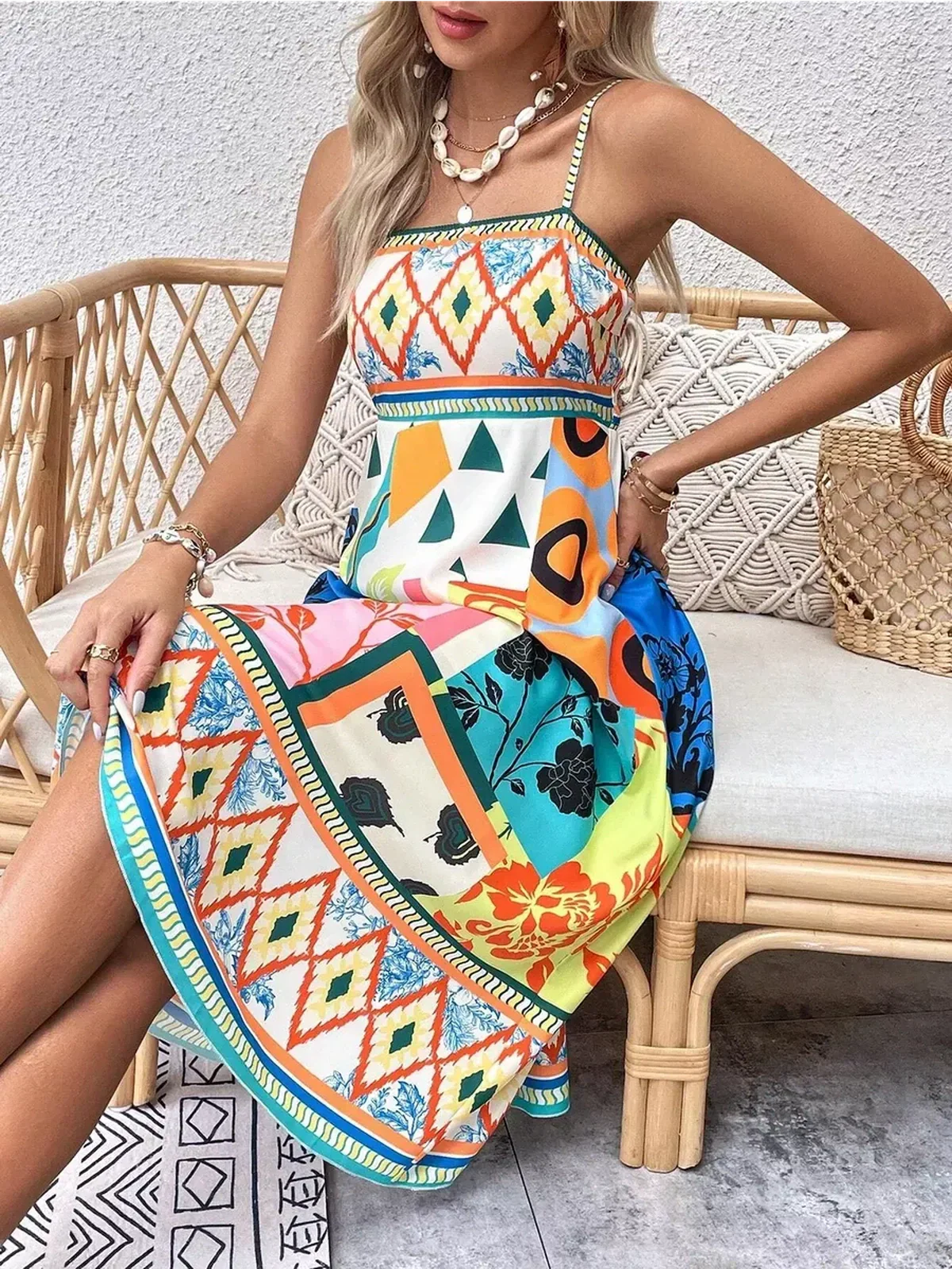Vibrant Festival Bloom Midi Dress featuring colorful patchwork prints, perfect for summer and wedding guest occasions.