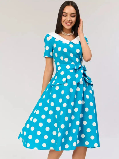 Retro Charm Midi Dress in blue with white polka dots and contrast collar, perfect for weddings or summer events.
