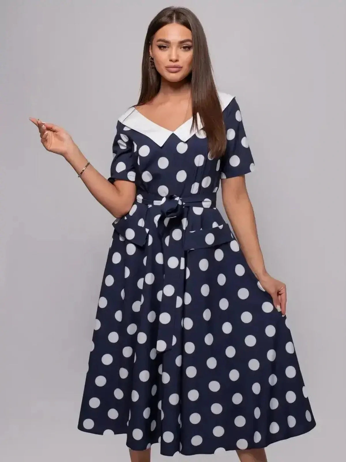 Nautical Charm Midi Dress with polka dots and white collar, perfect for summer weddings and garden parties.