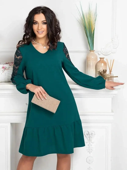 Elegant teal mini dress with lace sleeves, perfect for summer weddings or cocktail parties.
