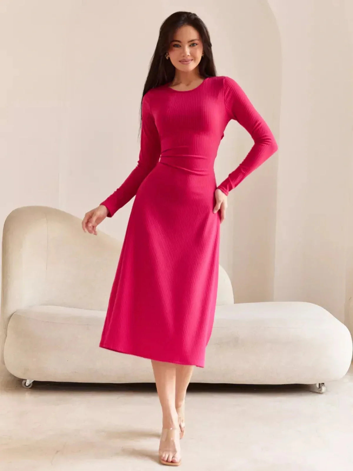 Elegant pink contour midi dress with long sleeves and a flattering fit, perfect for summer or special occasions.