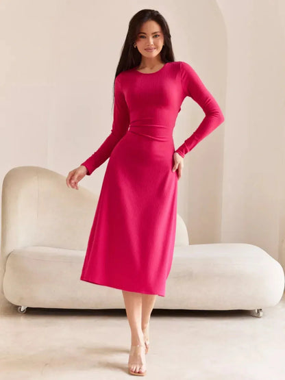 Elegant pink contour midi dress with long sleeves and a flattering fit, perfect for summer or special occasions.