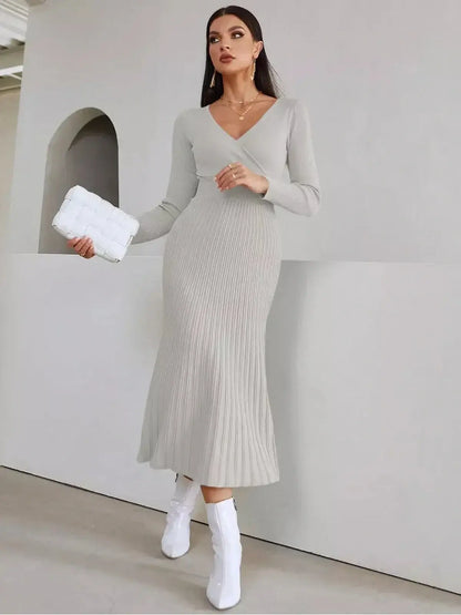 Sculpted Grace Midi Dress in soft ribbed texture, featuring a V-neckline and elegant fit for elegant occasions.