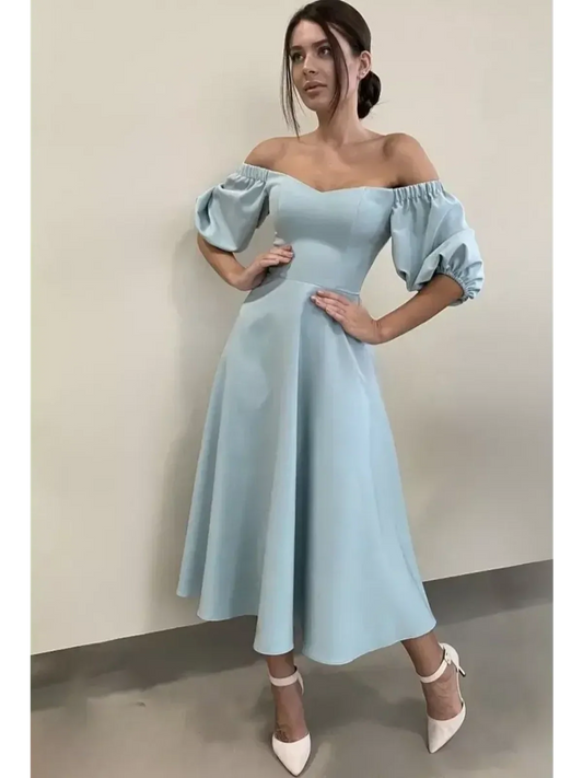 Serenity Midi Dress in mint-blue with off-shoulder neckline and puff sleeves, perfect for weddings or special occasions.