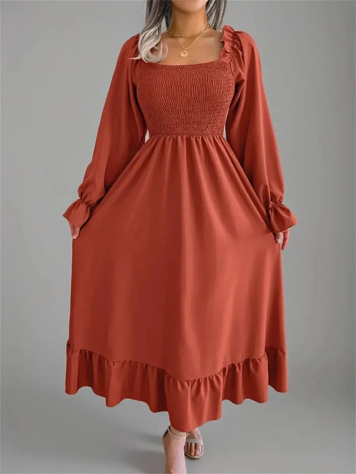 Rust Charm Midi Dress with smocked bodice and flowy skirt, perfect for wedding guest, summer events, or casual outings.