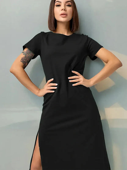 Black Essential Midi Dress with sleek side slit, perfect for casual or formal events.