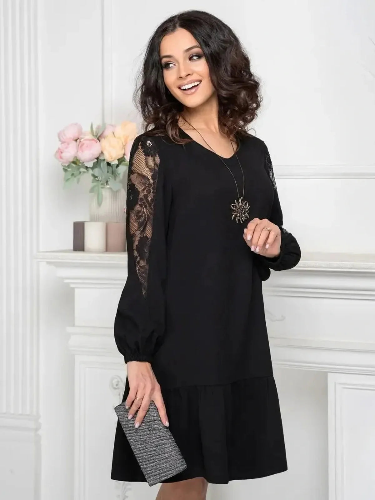 Elegant black dress with sheer floral lace sleeves, perfect for weddings, proms, and special occasions.