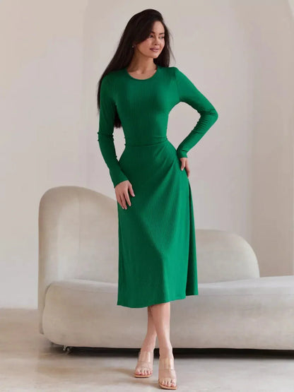 Elegant green Luxe Sculpt Midi Dress featuring a flattering fit and ribbed texture, perfect for chic events.