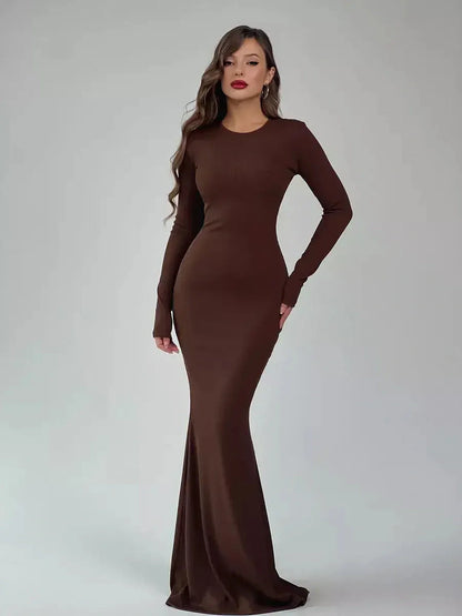 Sculpted Aura Maxi Dress in rich brown, featuring a fitted silhouette and long sleeves for elegant occasions.