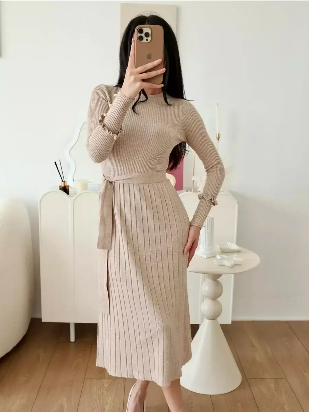 Serene Knit Midi Dress in ribbed beige with waist tie, perfect for wedding guest or formal occasions.