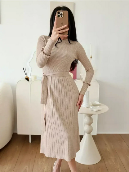 Serene Knit Midi Dress in ribbed beige with waist tie, perfect for wedding guest or formal occasions.