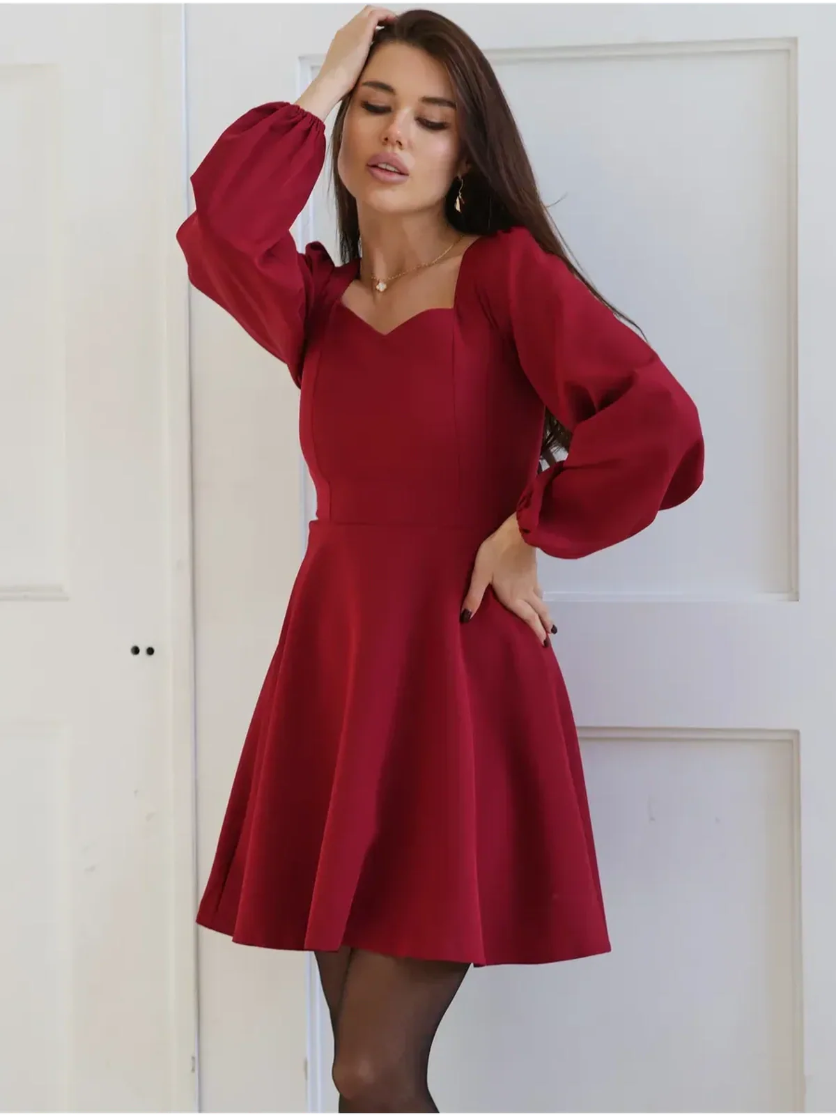 Ruby Flare red mini dress with sweetheart neckline and puff sleeves, perfect for weddings, proms, or special occasions.
