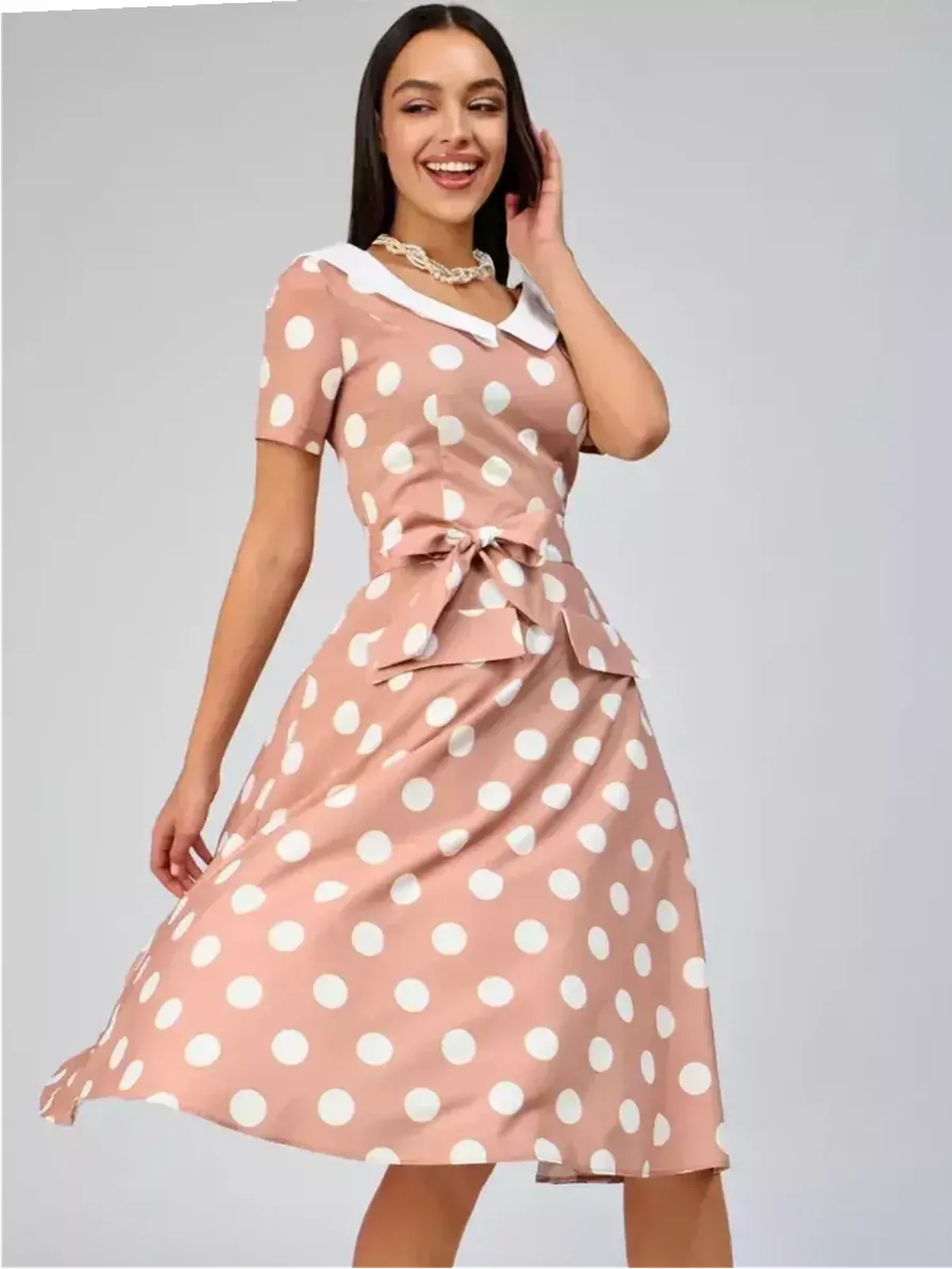 Vintage Muse Midi Dress in beige with polka dots and white collar, perfect for summer weddings and garden parties.