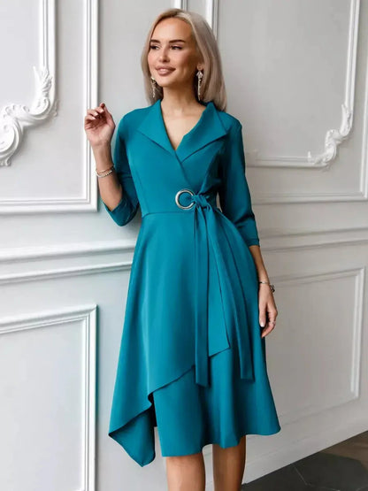 Sea Grace Midi Dress in sea wave teal, featuring a tailored wrap style and A-line skirt for modern femininity.