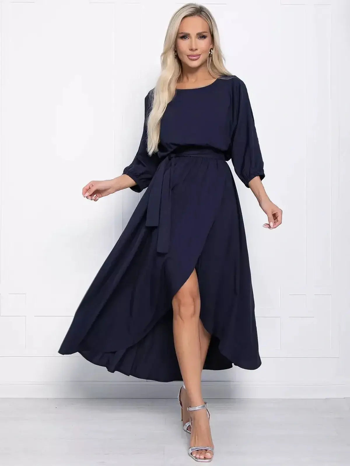 Sapphire Grace Midi Dress in navy with boat neckline, flowing silhouette, and waist tie for elegant all-day comfort.