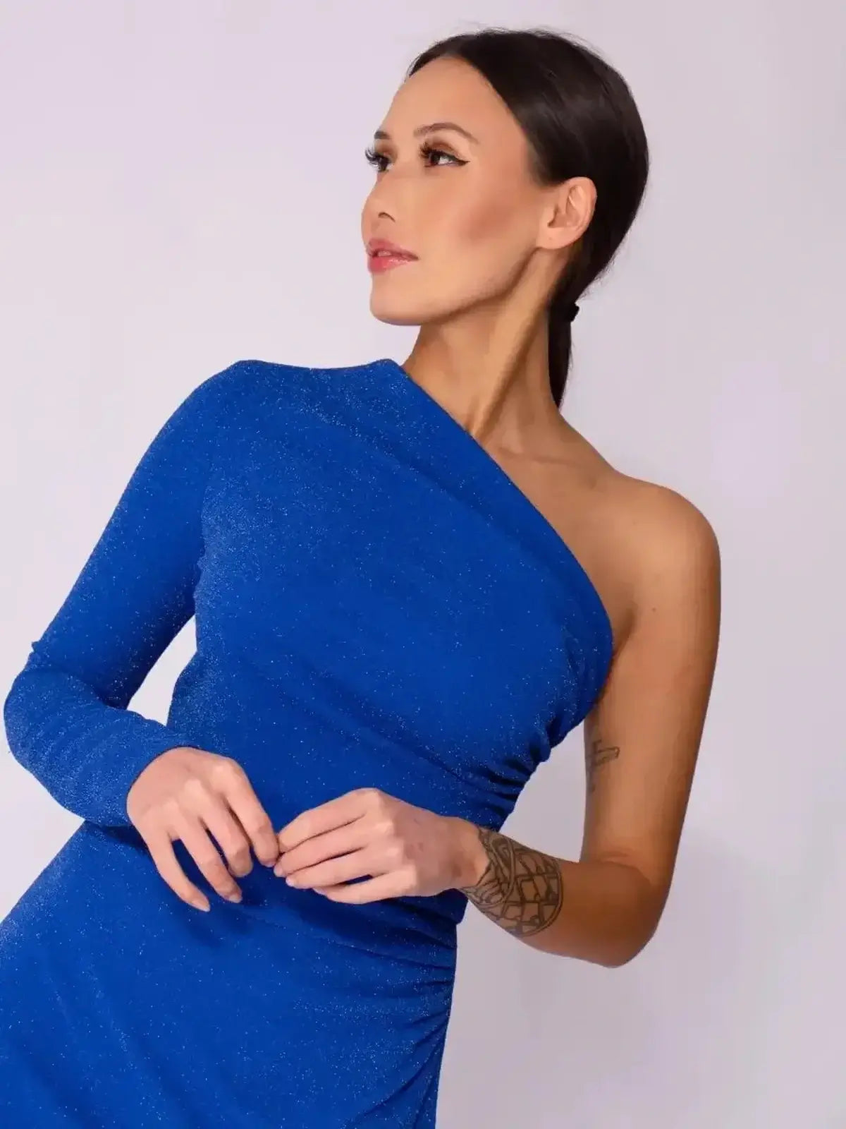 One-shoulder Sapphire Curve Maxi Dress in electric blue, showcasing a curve-hugging silhouette, ideal for formal occasions.