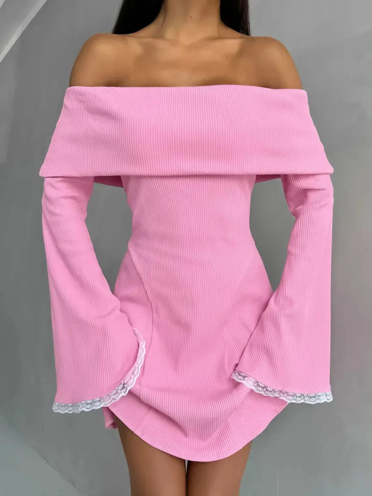 Pink off-shoulder Blush Belle Mini Dress with flared lace cuffs, perfect for summer events and wedding guest dresses.