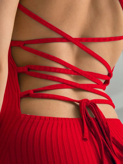 Scarlet Lace Midi Dress featuring a corset-style lace-up back detail, perfect for wedding guest or cocktail events.