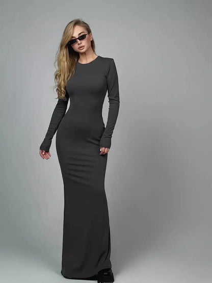 Sculpted Grace Maxi Dress in dark gray, featuring long sleeves and a fitted silhouette, perfect for formal occasions or evening wear.