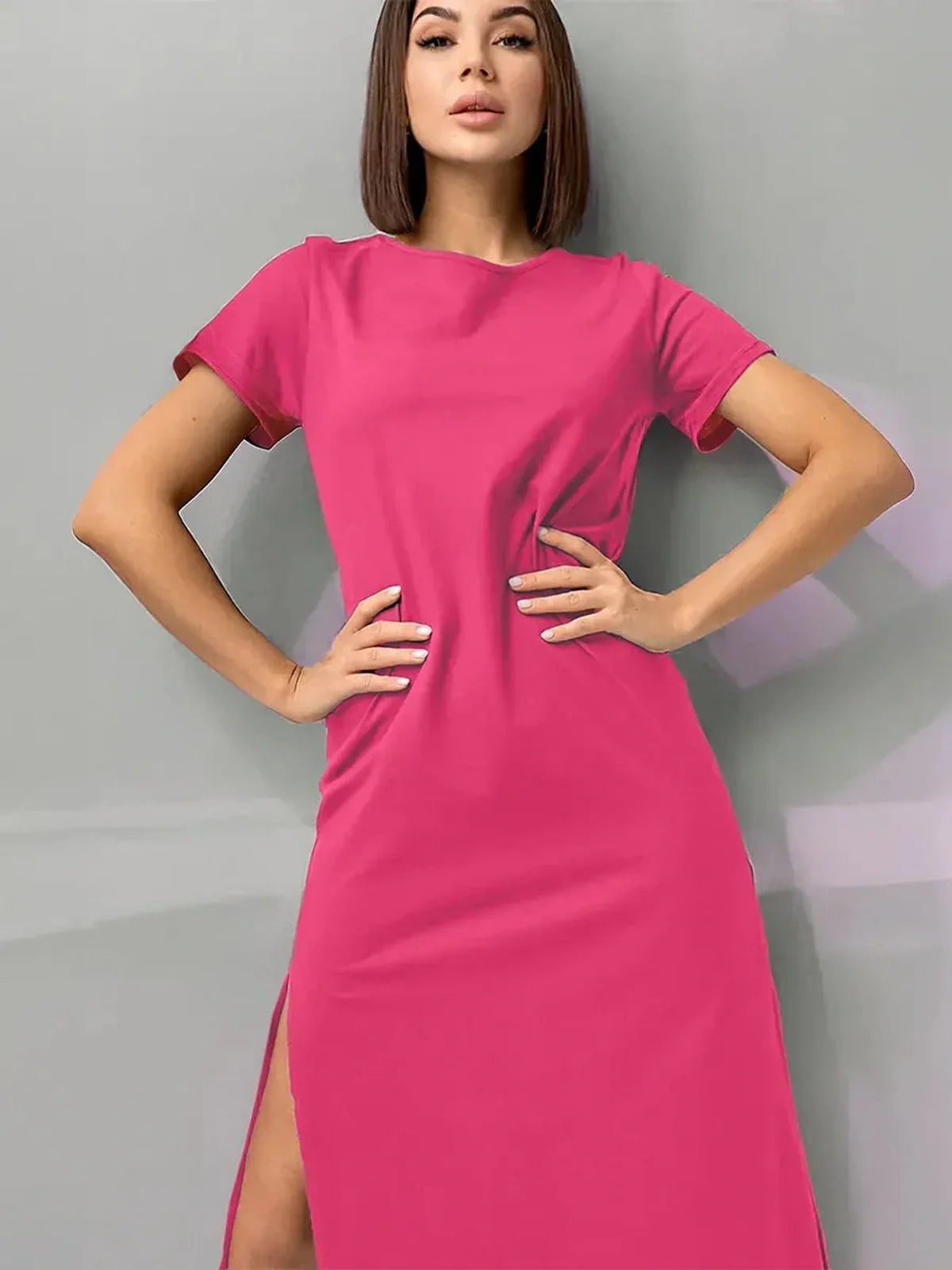 Breeze Midi Dress in vibrant raspberry pink with playful side slits, perfect for summer and casual outings.
