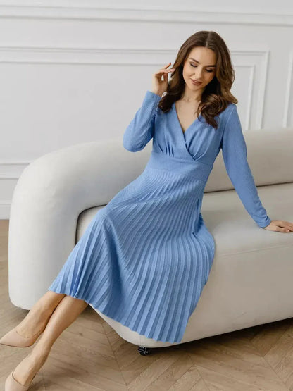 Celeste Midi Dress in serene sky blue, showcasing elegant pleats and a V-neckline, perfect for summer occasions and weddings.