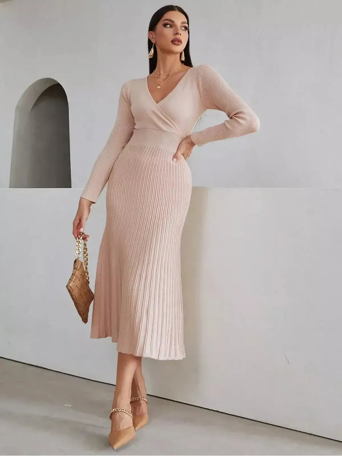Blush Grace Midi Dress features a sculpting fit with a wrap-effect bodice and pleated skirt, perfect for weddings or formal events.