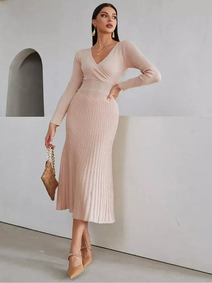 Blush Grace Midi Dress features a sculpting fit with a wrap-effect bodice and pleated skirt, perfect for weddings or formal events.