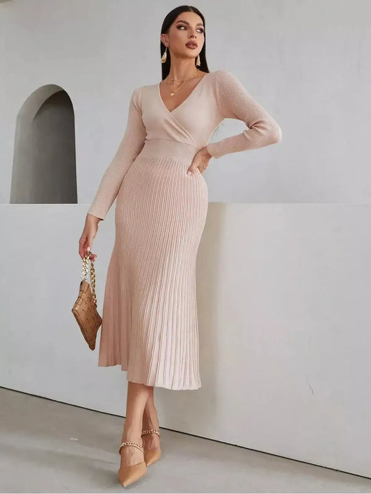 Blush Grace Midi Dress features a sculpting fit with a wrap-effect bodice and pleated skirt, perfect for weddings or formal events.