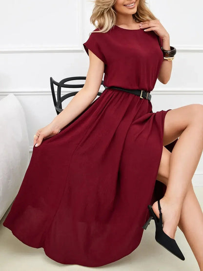 Sculpted Ease Maxi Dress in deep burgundy with a cinched waist and flowing skirt, perfect for summer or formal occasions.