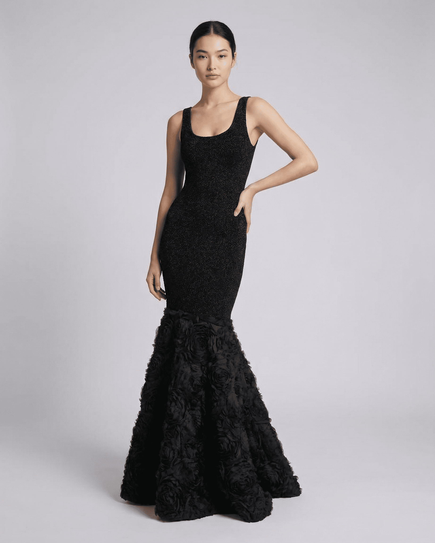 Nocturne Maxi Dress by Slimona, featuring a sculpted silhouette and textured hem detail, elegant black evening gown.