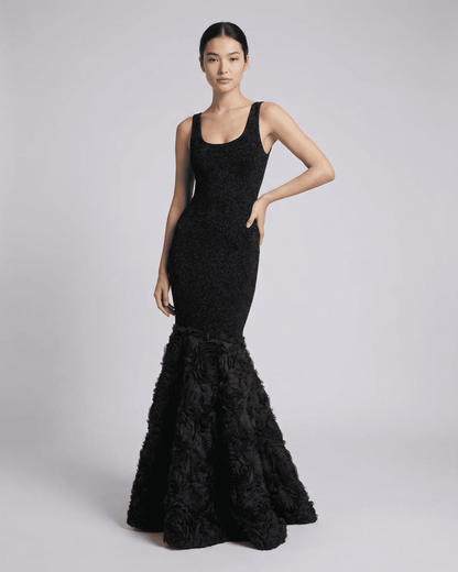 Nocturne Maxi Dress by Slimona, featuring a sculpted silhouette and textured hem detail, elegant black evening gown.