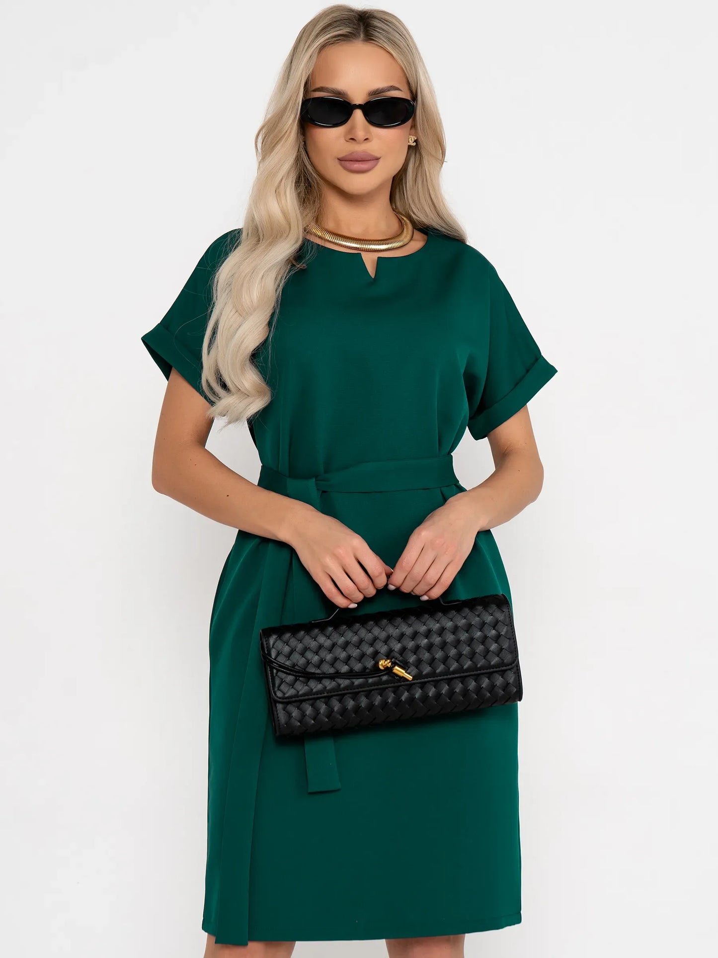 Elegant green mini dress with notched neckline, cuffed sleeves, and fabric belt, perfect for weddings or casual outings.