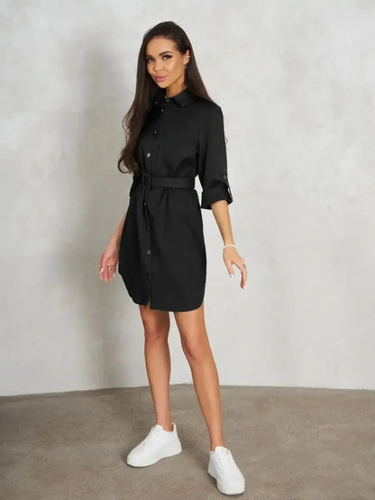 Urban Edit Mini black dress with structured silhouette and detachable belt, ideal for casual to formal occasions.