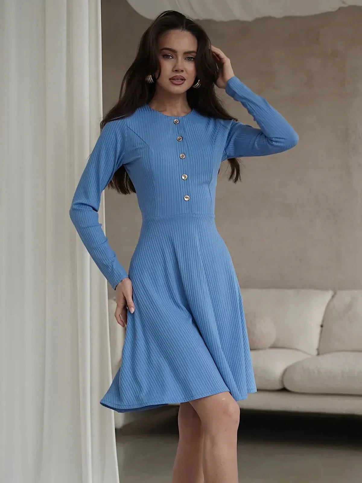 Skyline Muse mini dress in sky-blue, featuring ribbed knit, long sleeves, and a flattering A-line cut, perfect for summer occasions.