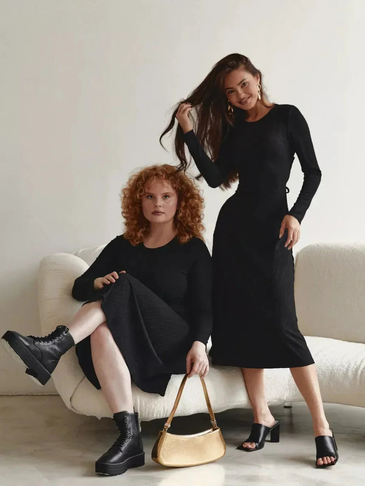 Two women in black Midi Dress showcase elegance and style, ideal for weddings or casual outings.